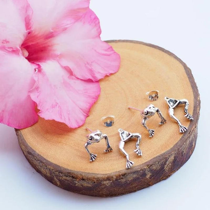 Pair of Unisex Two-Way Frog Ear Jacket Earrings, showcasing intricate nature jewelry details