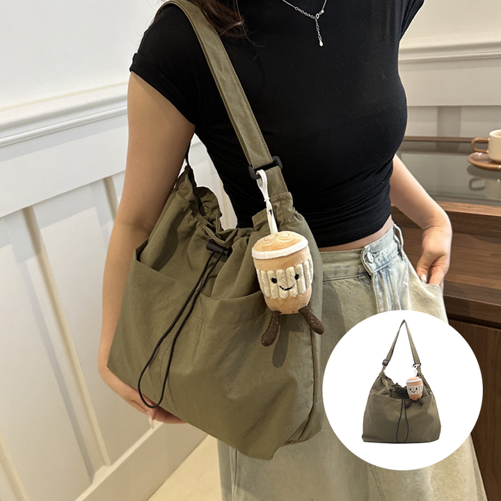 Lightweight unisex messenger bag, black nylon, adjustable strap, for casual crossbody wear