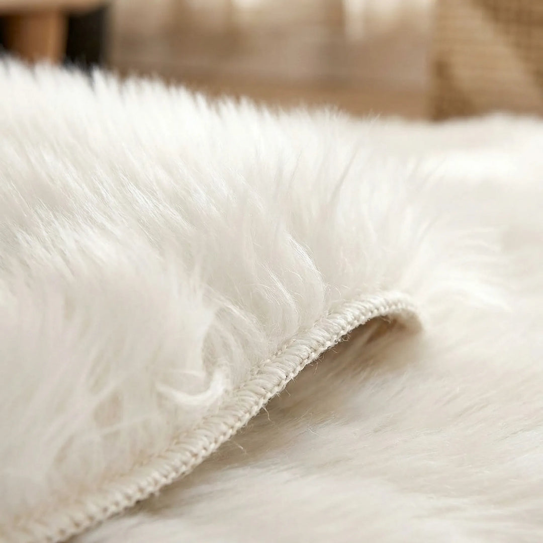 Flowique oval plush faux fur area rug, ultra-soft and comfortable for any cozy living space.