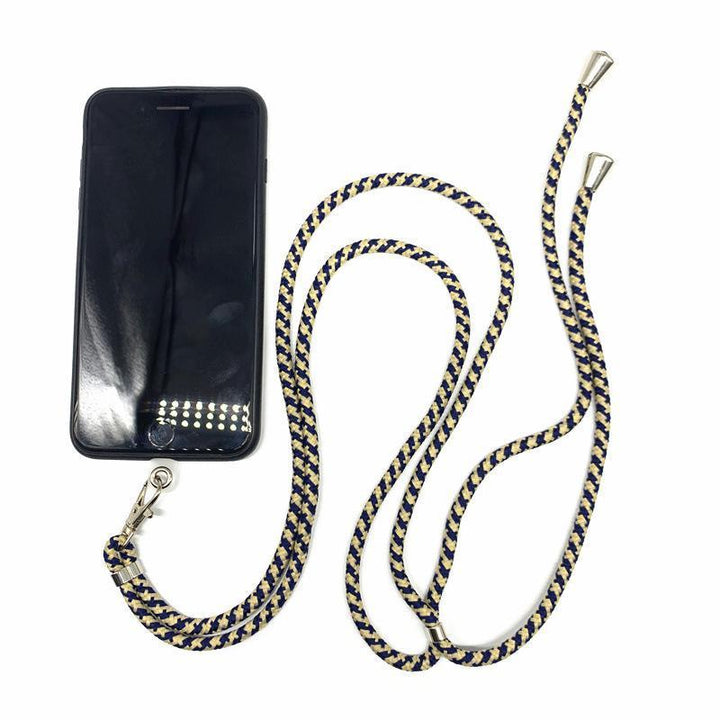 Lifestyle shot of a universal detachable phone lanyard attached to a phone, ready for hands-free adventure.