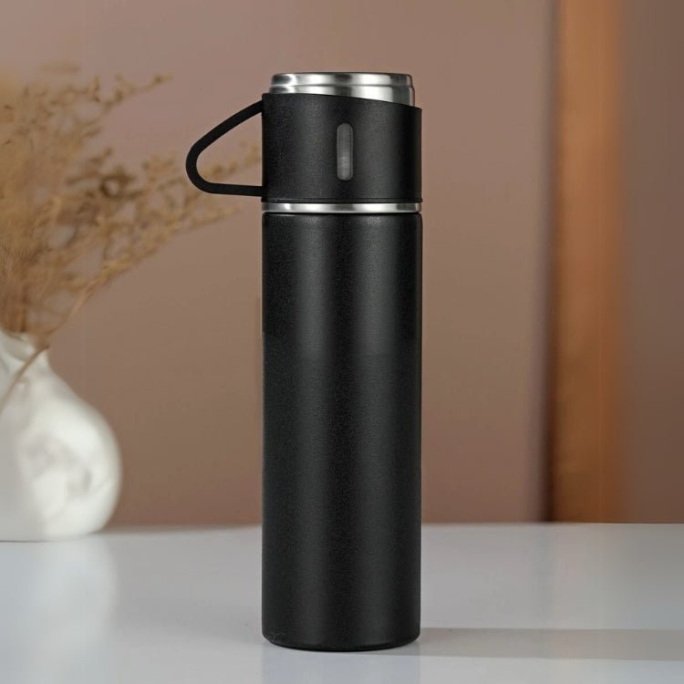Unisex vacuum insulated stainless steel water bottle, keeps drinks hot or cold. Leak-proof & portable.