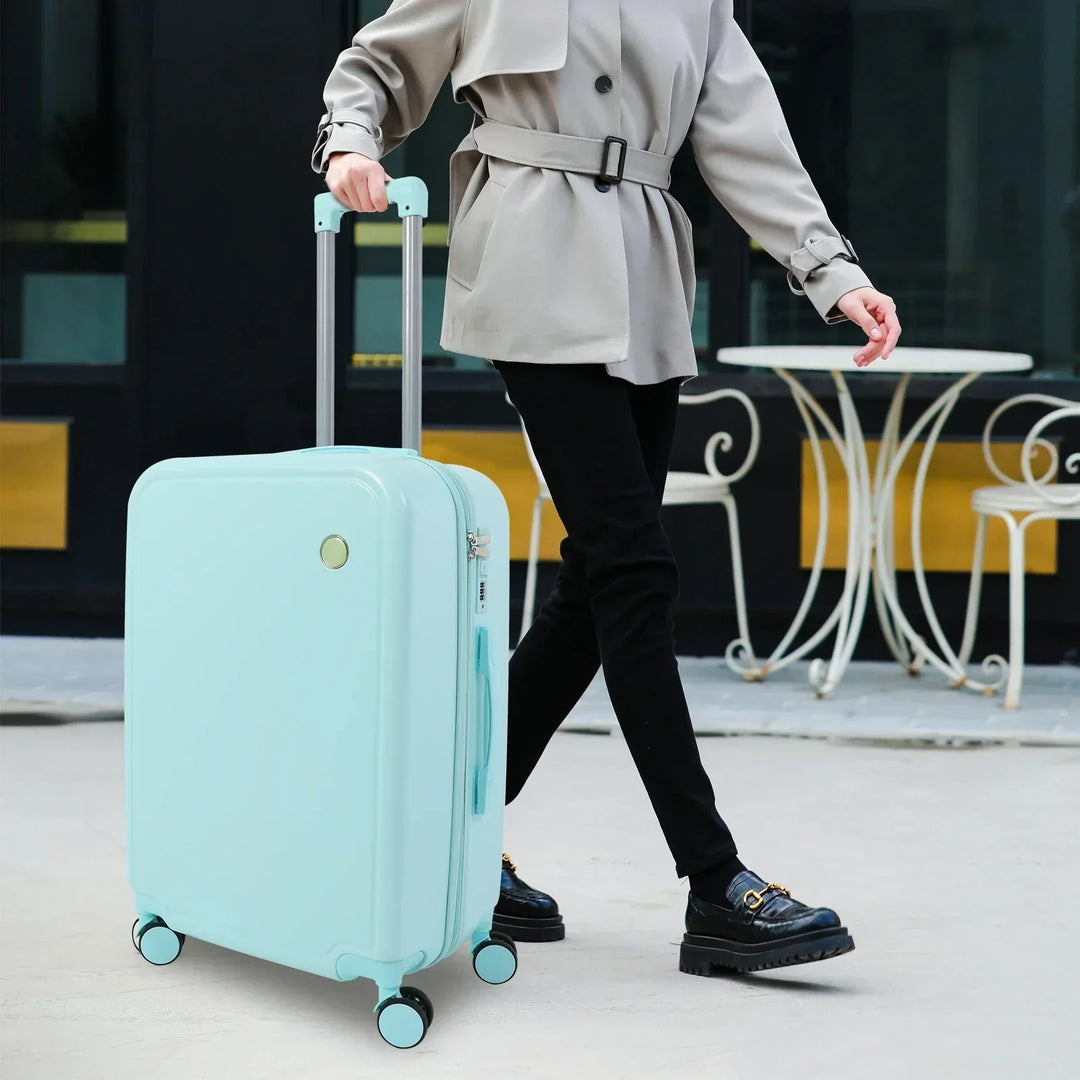 Travel in style with the Vienna Duo hard shell luggage set. Pink & green suitcases, durable & chic.