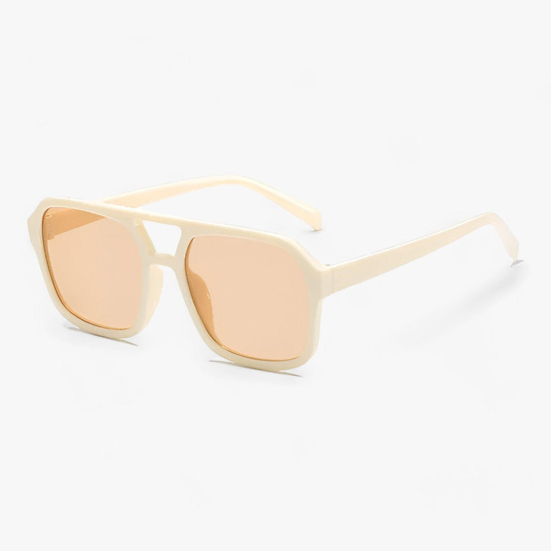 Chic oversized square frame sunglasses. Unisex vintage design with dark lenses for effective UV protection.