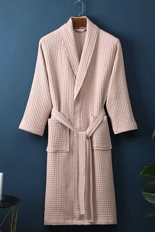 Comfortable unisex waffle robe, perfect for relaxation at home or the spa. Soft, quick-drying loungewear.