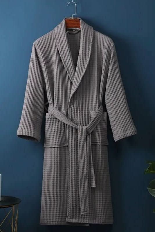 Stylish unisex waffle robe, ideal breathable loungewear for relaxing moments at home, spa, or resort.