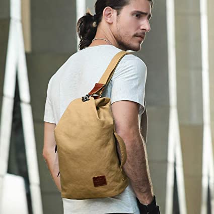 Unisex water-resistant canvas crossbody bag with anti-theft pocket, perfect for daily essentials & travel.