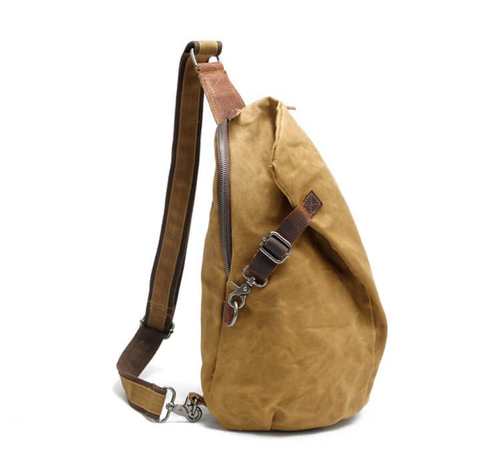 Versatile canvas multiwear bag: wear as a crossbody, sling, or shoulder bag for daily use.