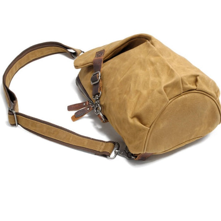 Robust water-resistant canvas crossbody bag, durable design perfect for active daily use.