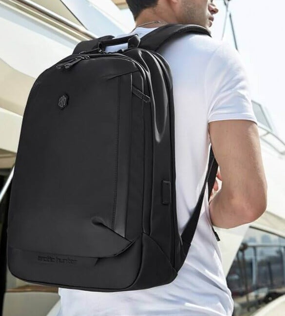 Unisex water-resistant multi-compartment backpack, ideal for travel, hiking, or daily commute.