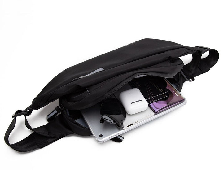 Unisex water-resistant multi-pocket fanny pack for travel & sport. Hands-free waist bag for active lifestyle.