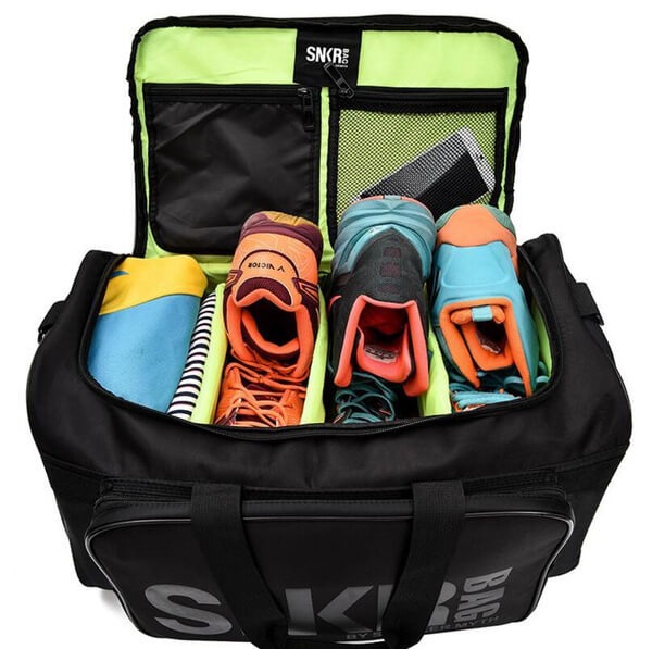 Water-resistant travel bag for sneakers & gear. Keeps contents dry & organized during travel. Ideal for shoes.