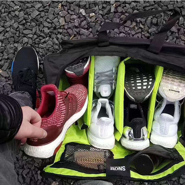 Organized unisex travel bag with dedicated compartments for sneakers, gear & accessories. Water-resistant.