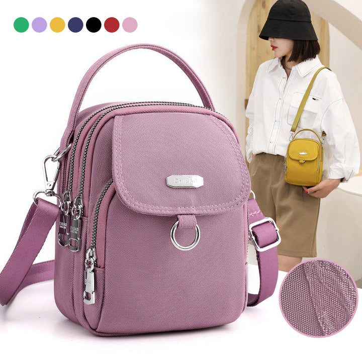 Unisex waterproof crossbody messenger bag with multiple pockets, black nylon, for travel & daily use