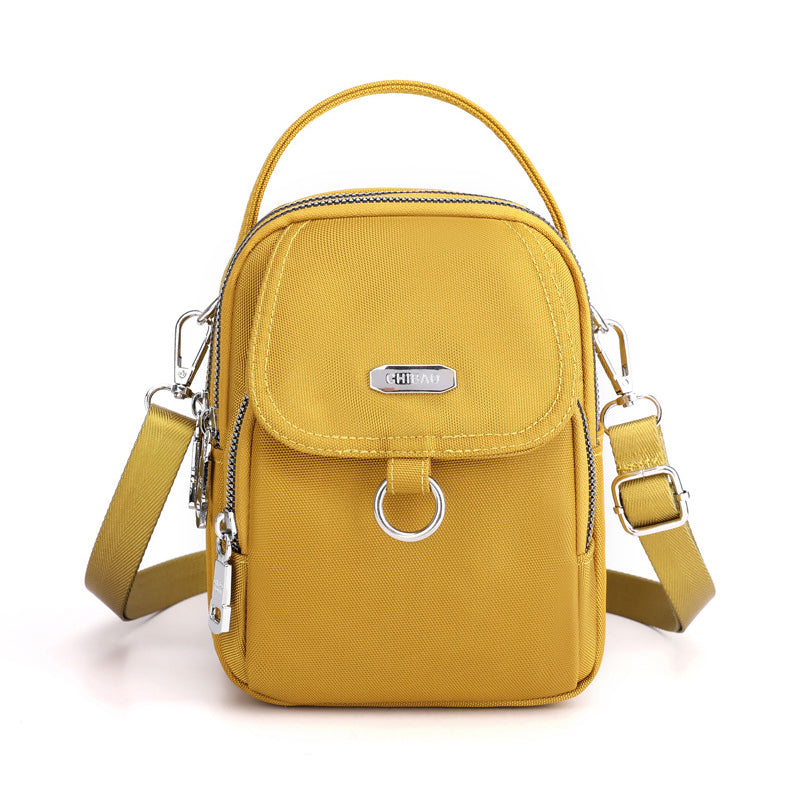 Travel essential unisex messenger bag, waterproof nylon, comfortable across body or shoulder