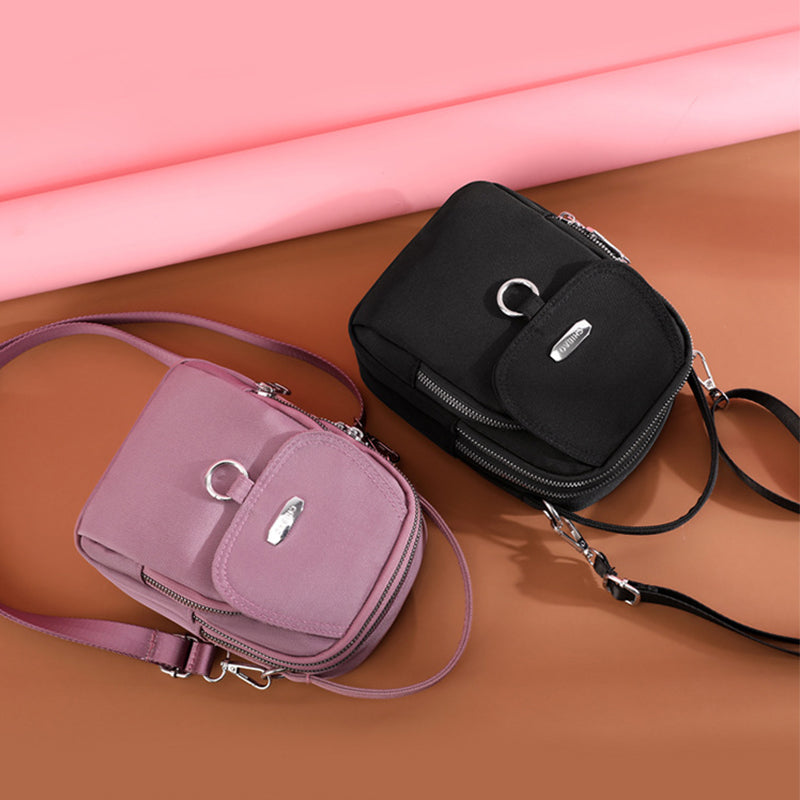 Waterproof nylon crossbody bag, unisex, multipocket design, ideal for daily commutes & travel
