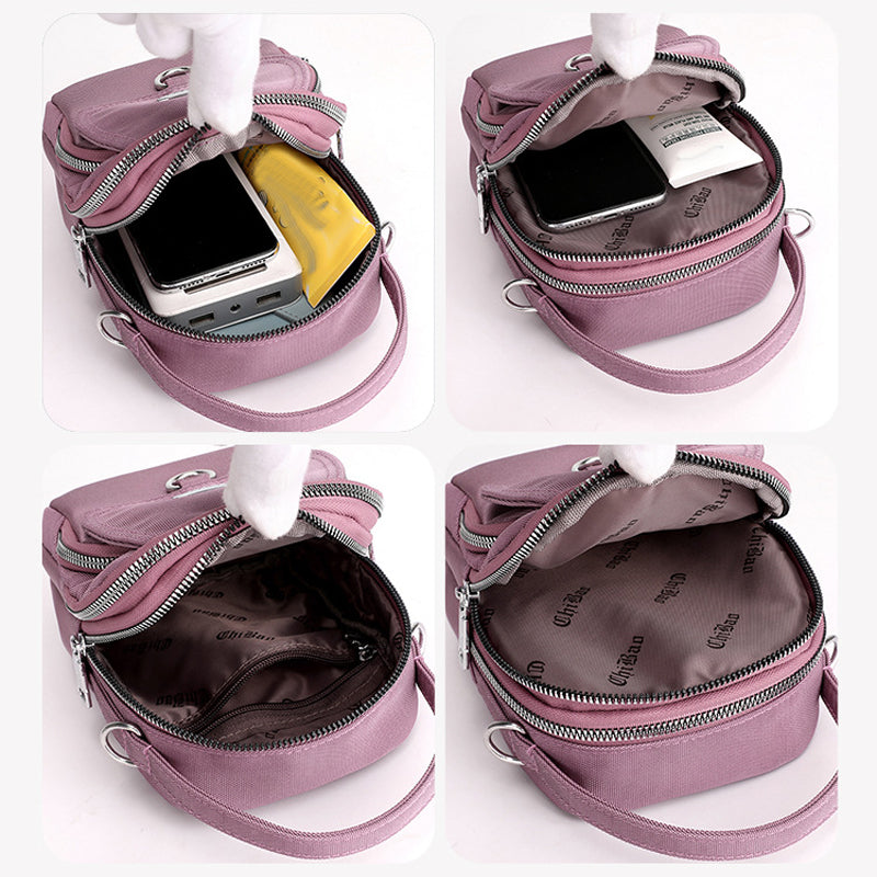 Stylish waterproof unisex shoulder bag, black, multi-pocket design, durable nylon material