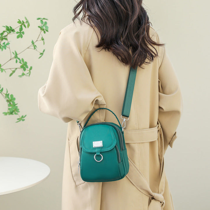 Durable nylon waterproof shoulder bag, perfect for men and women, with adjustable strap