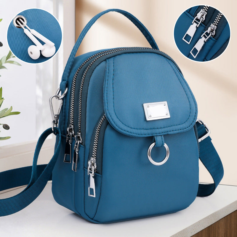 Back view of functional nylon travel bag, showcasing comfortable adjustable strap