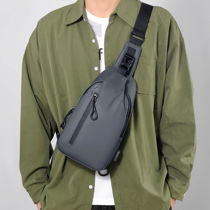 Interior of the travel sling bag, revealing its spacious main compartment for essentials.