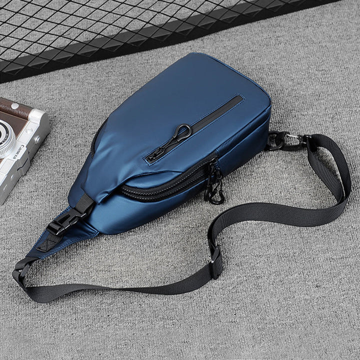 Unisex sling bag worn across the chest, demonstrating comfortable fit and easy access.