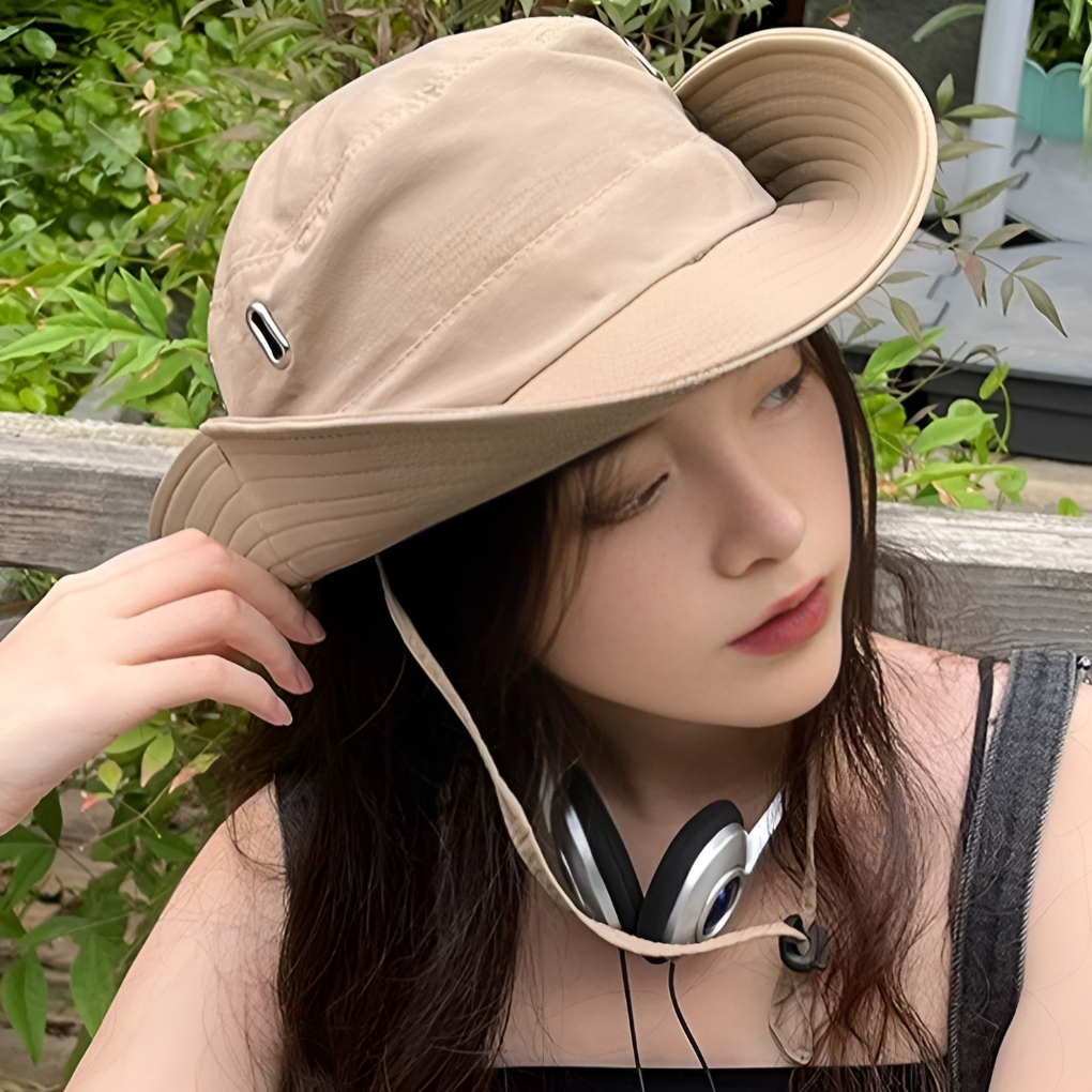 Stylish unisex wide brim sun hat, foldable for travel, offers maximum UV protection for outdoor adventures.