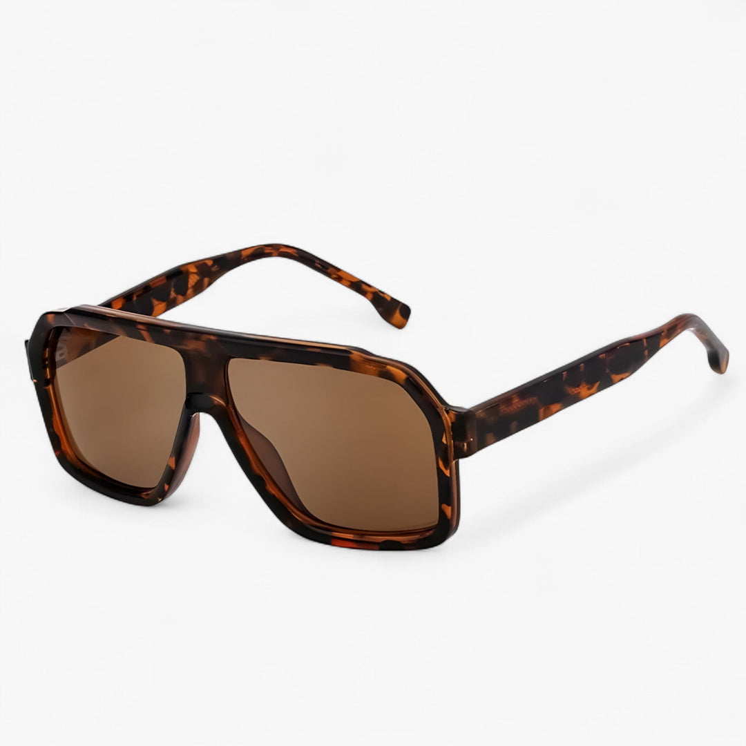 Edgy oversized punk sunglasses, windproof for active wear. Unisex, UV400 protected lenses, durable design.