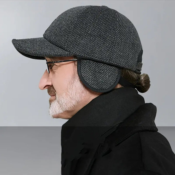 Unisex winter baseball cap with folded ear flaps, front view, charcoal grey wool blend, warm outdoor hat