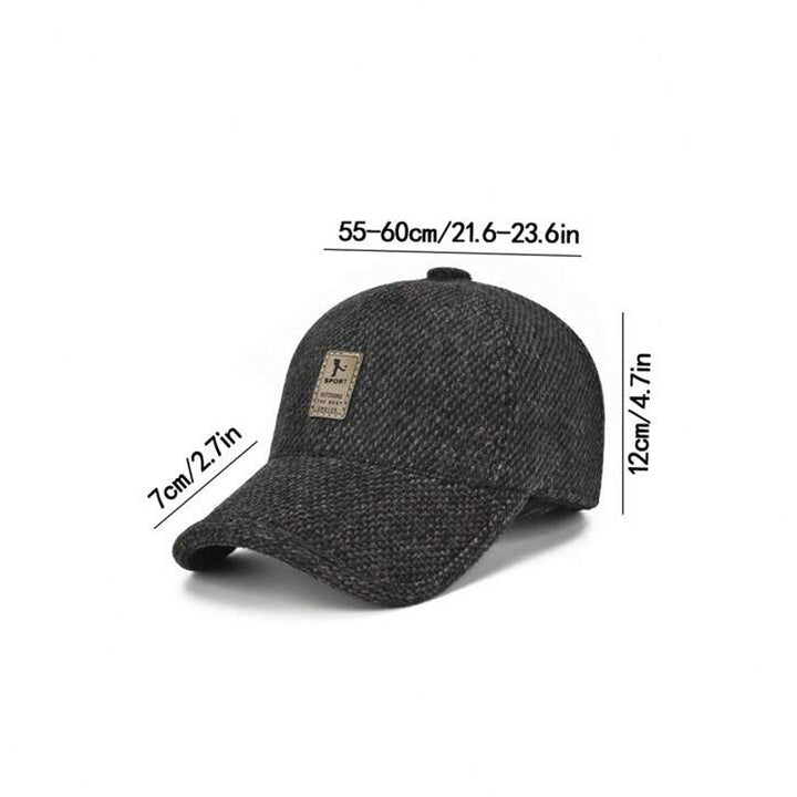 Unisex winter baseball cap, navy blue, with ear flaps partially unfolded, ready for changing weather