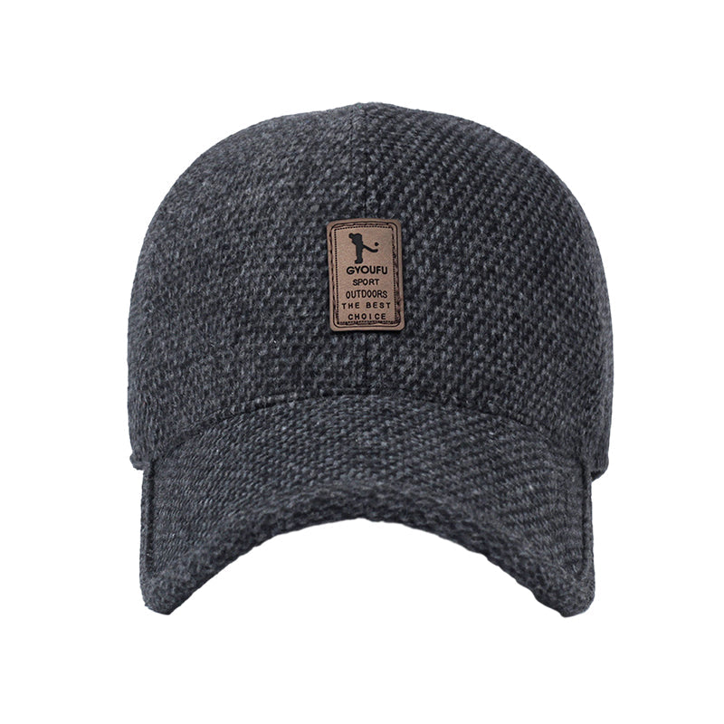 Unisex winter baseball cap, side profile, beige, highlighting its classic baseball cap shape and added warmth