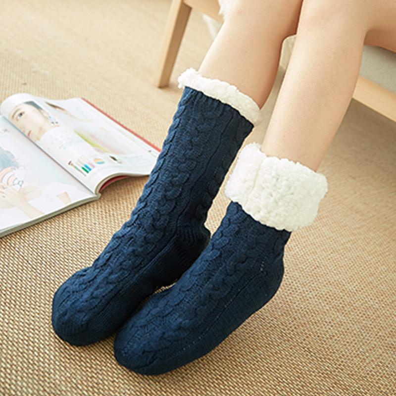 Deep blue unisex slipper socks, fleece-lined, anti-slip bottom, keeping feet warm & secure.