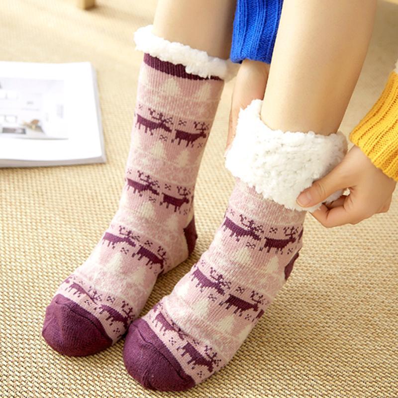 Close-up of anti-slip sole on unisex fleece-lined slipper socks, ideal for winter warmth.