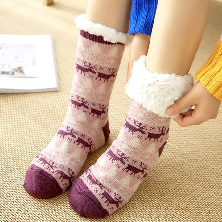 Close-up of anti-slip sole on unisex fleece-lined slipper socks, ideal for winter warmth.