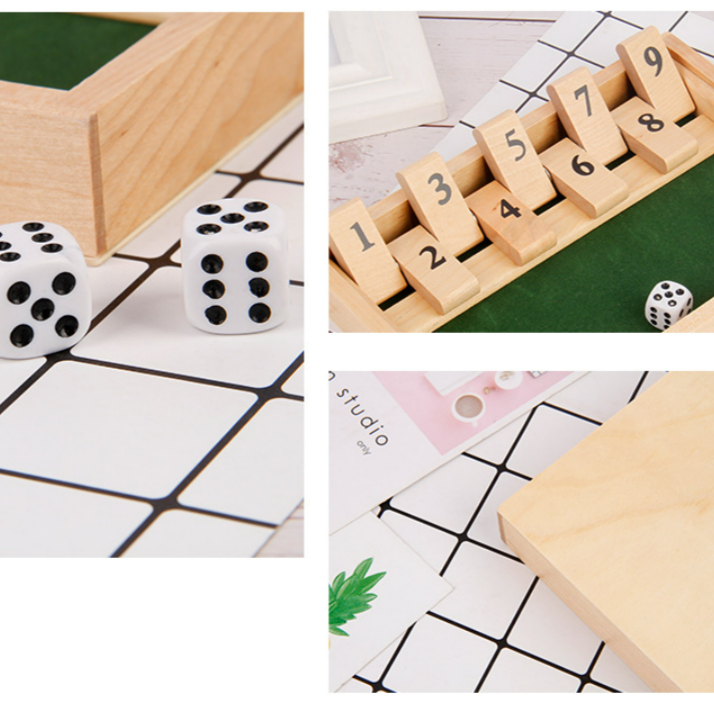 Hands rolling dice during a fun math board game, perfect for parties and travel