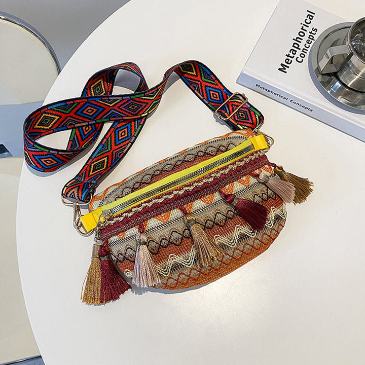 Detailed shot of the vibrant, multicolored woven fabric of a bohemian unisex waist bag.