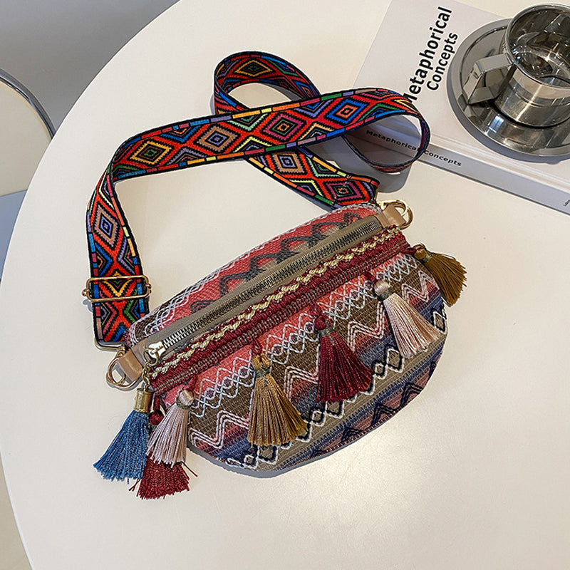 Unisex bohemian shoulder bag, made from durable woven canvas with a colorful design.