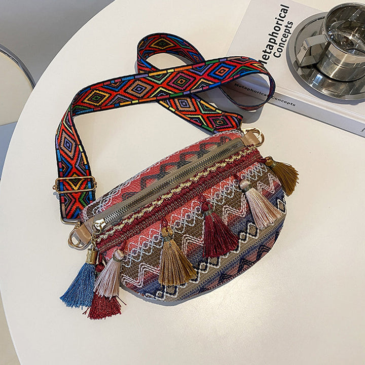 Unisex bohemian shoulder bag, made from durable woven canvas with a colorful design.