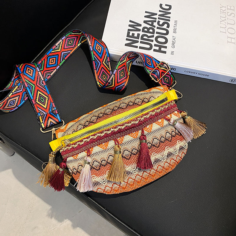 Festival-ready, colorful woven bohemian bag, adjustable for waist or shoulder wear, unisex.