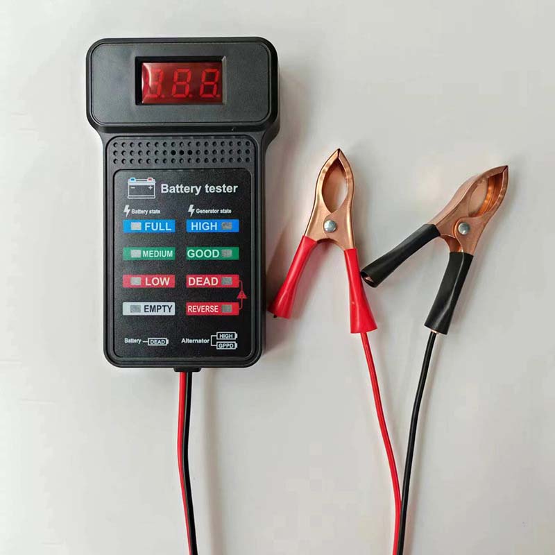 Set of automotive tools including a 12V car battery tester, crucial for comprehensive vehicle electrical diagnostics.