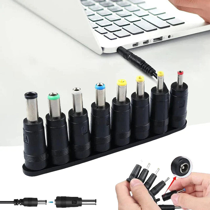 Arrangement of 8 black universal DC power adapter tips, a versatile electronics tool accessory