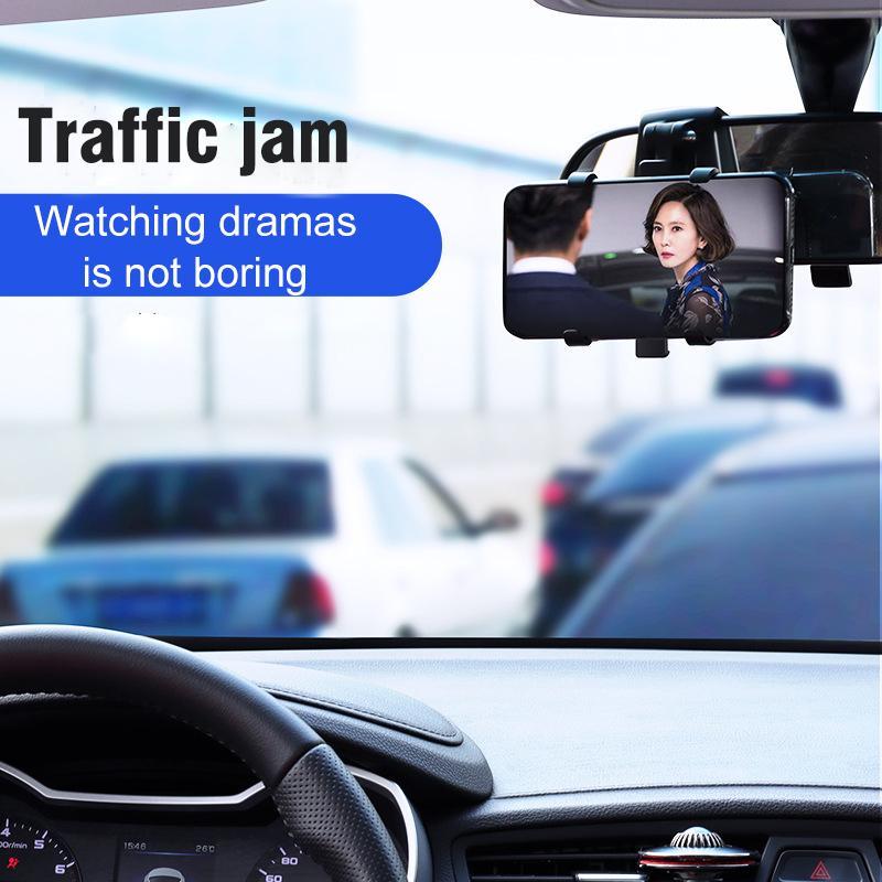 Black universal phone holder mounted on a car's dashboard, perfect for easy GPS viewing while driving