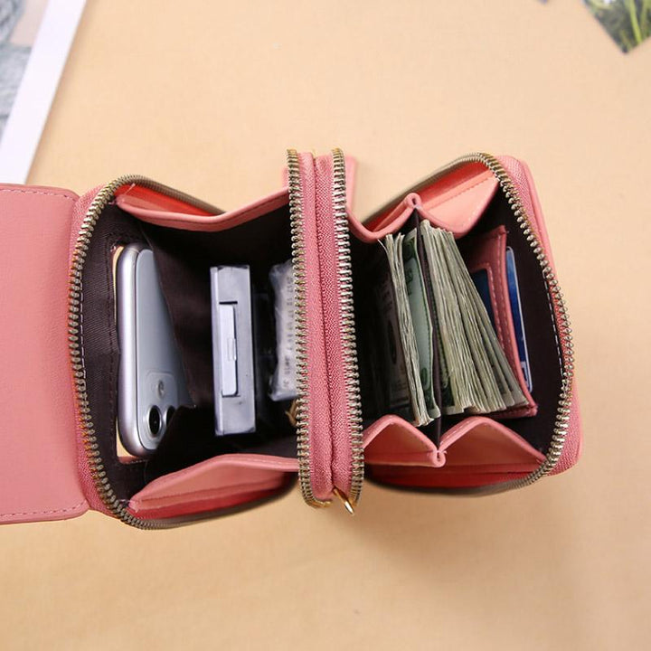 Rear view of a red universal phone case worn as a crossbody bag; showcasing discreet card slots. Essential travel accessory.