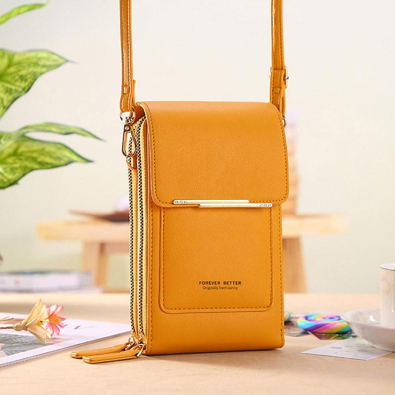 Universal crossbody phone case in light pink with gold-tone hardware; ideal mini bag for essentials. PU leather wallet.