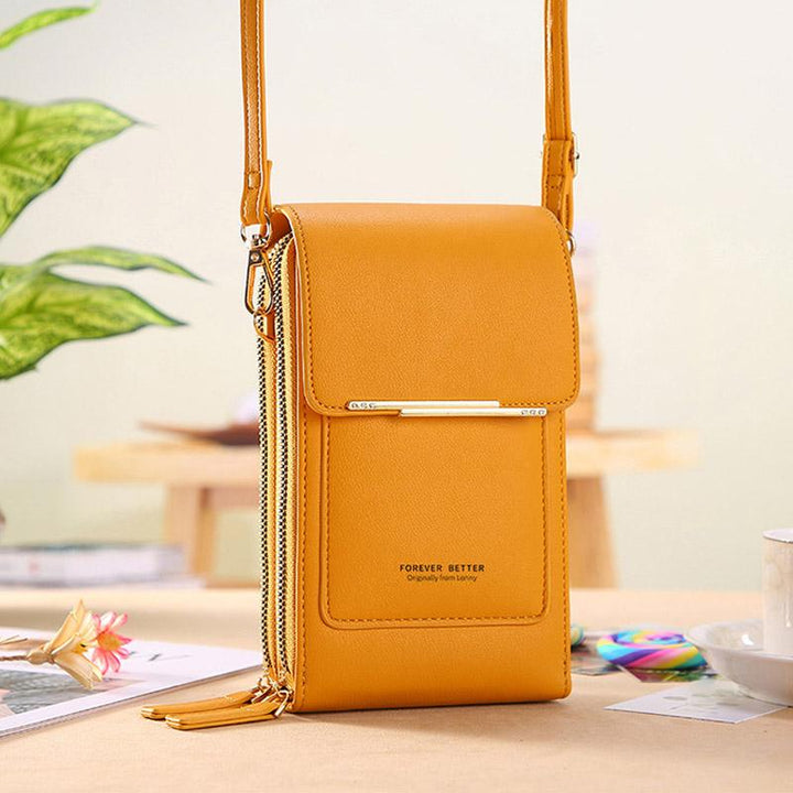 Universal crossbody phone case in light pink with gold-tone hardware; ideal mini bag for essentials. PU leather wallet.