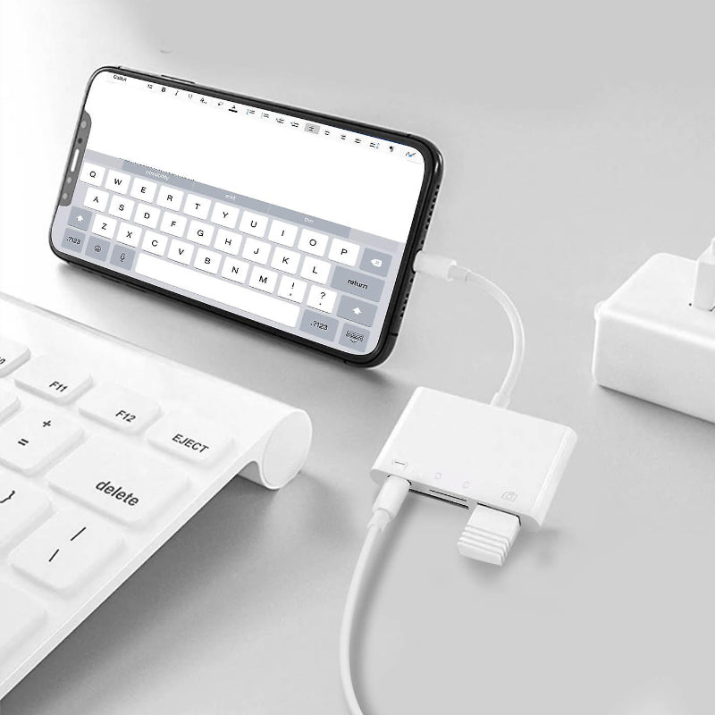 A universal mobile memory card reader on a white background, demonstrating its clean design and functional utility