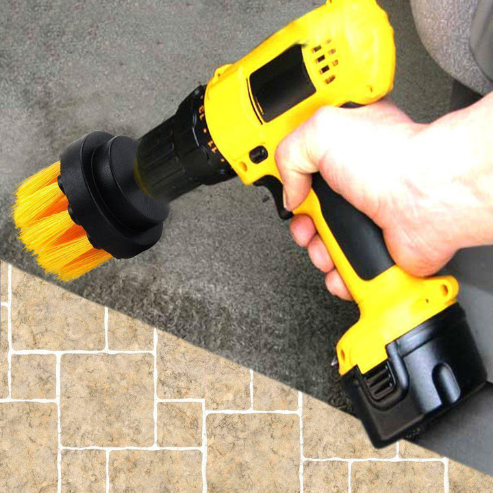 Various power scrubber accessories from the kit, including extension and different brushes for comprehensive home cleaning.