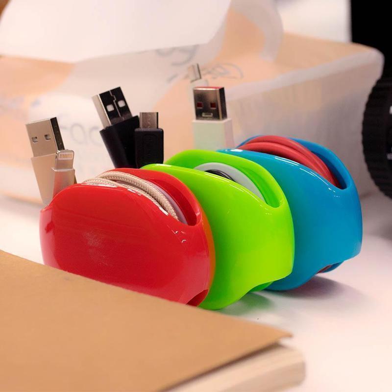 Compact Tangle-Free Cable Organizer for earphones shown on a white background
