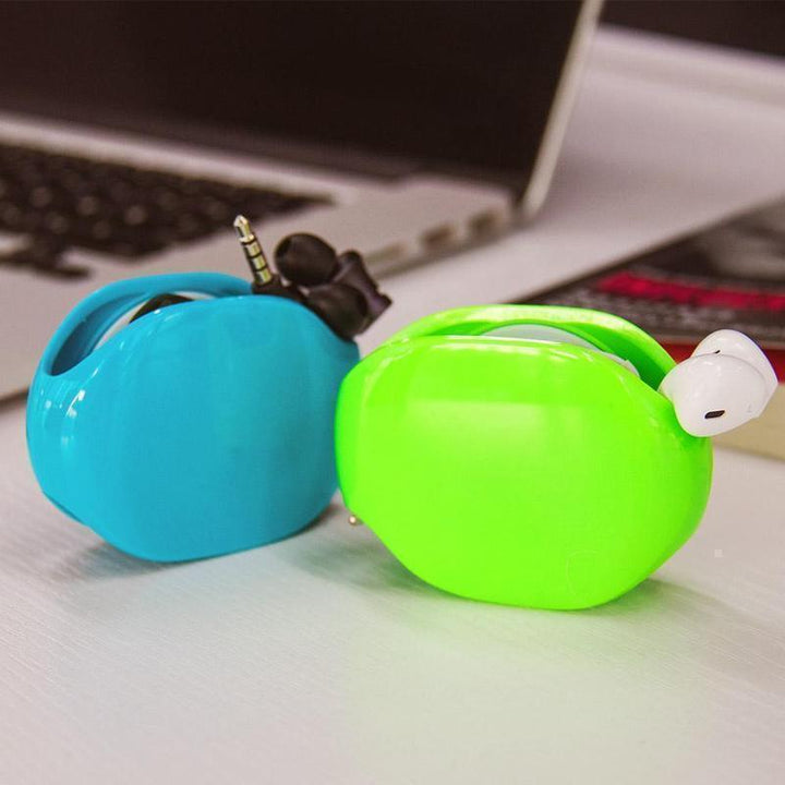 Portable Tangle-Free Cable Organizer managing USB and earbud cords effectively