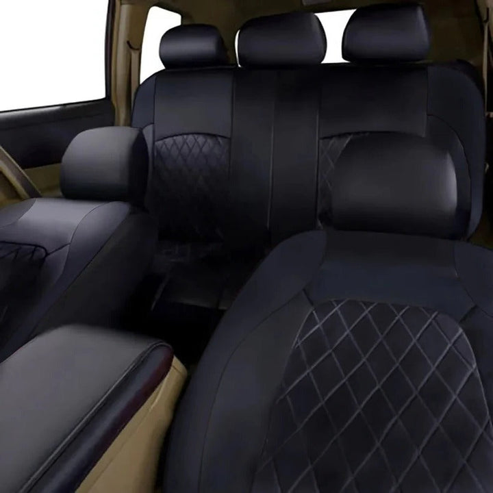 Black PU leather universal waterproof car seat covers. Easy clean & scratch-resistant for 5 seat vehicles.