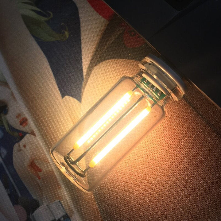 USB night light with intuitive touch dimming, creating a warm, inviting atmosphere.