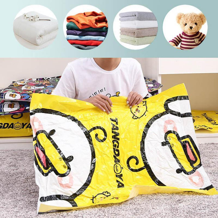 Travel storage vacuum bags with clothes neatly compressed, highlighting portability